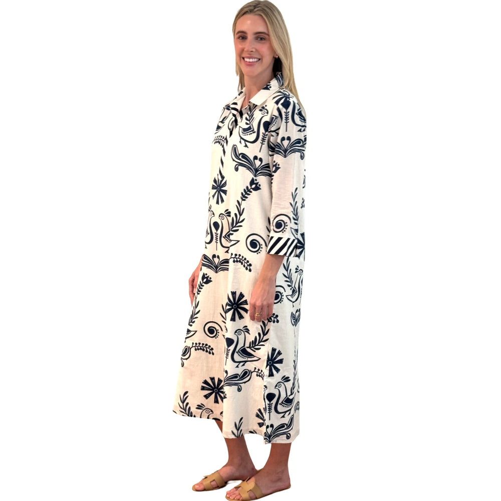 The Lisette Cotton Dress in White and Navy Bird Print — view 2
