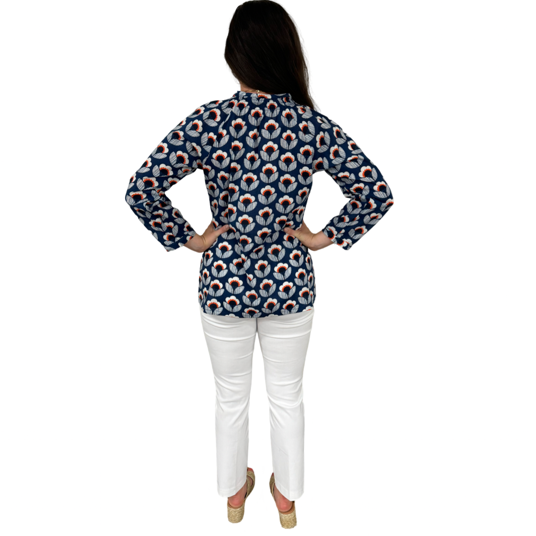 The Dahlia Smocked Neck Top in Navy and Orange Floral — view 8