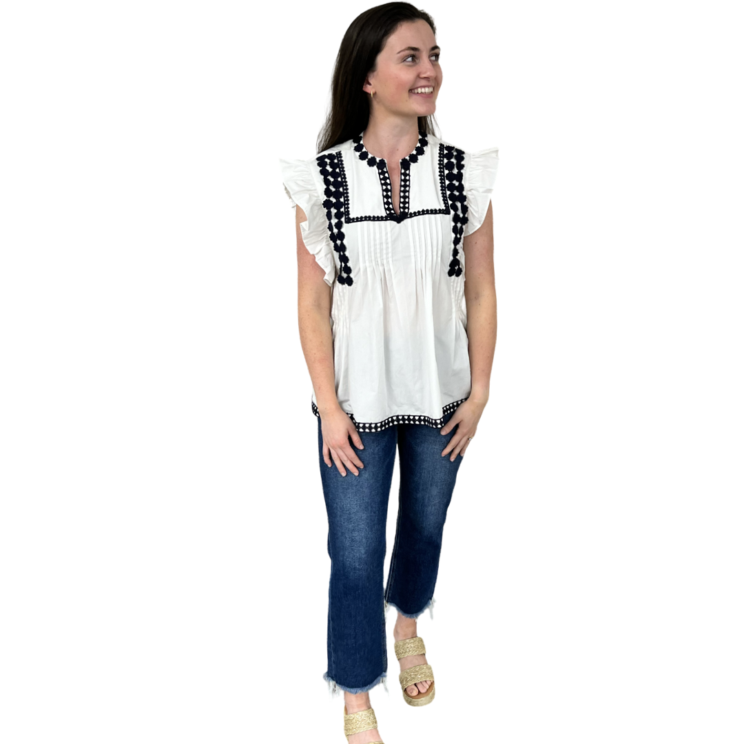 The Huntley White Flutter Sleeve Top with Navy Crochet Trim — view 4