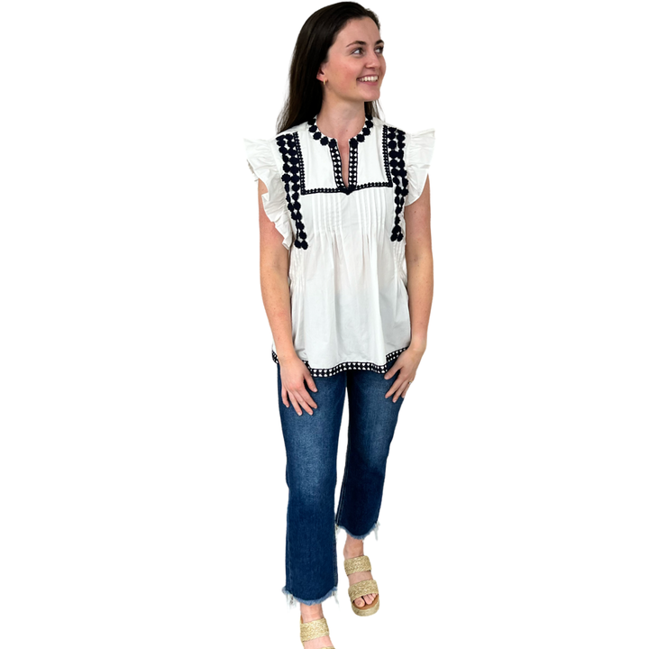 The Huntley White Flutter Sleeve Top with Navy Crochet Trim — view 4