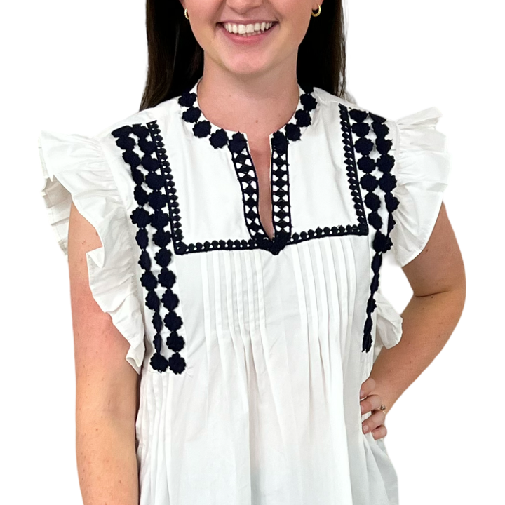 The Huntley White Flutter Sleeve Top with Navy Crochet Trim — view 3