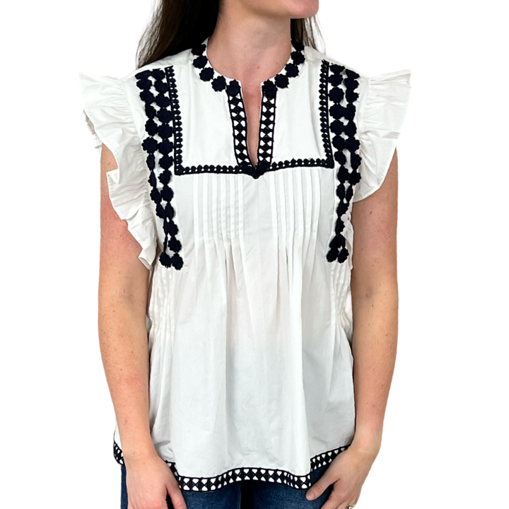The Huntley White Flutter Sleeve Top with Navy Crochet Trim — view 2