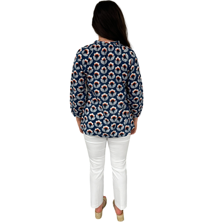 The Dahlia Smocked Neck Top in Navy and Orange Floral — view 7