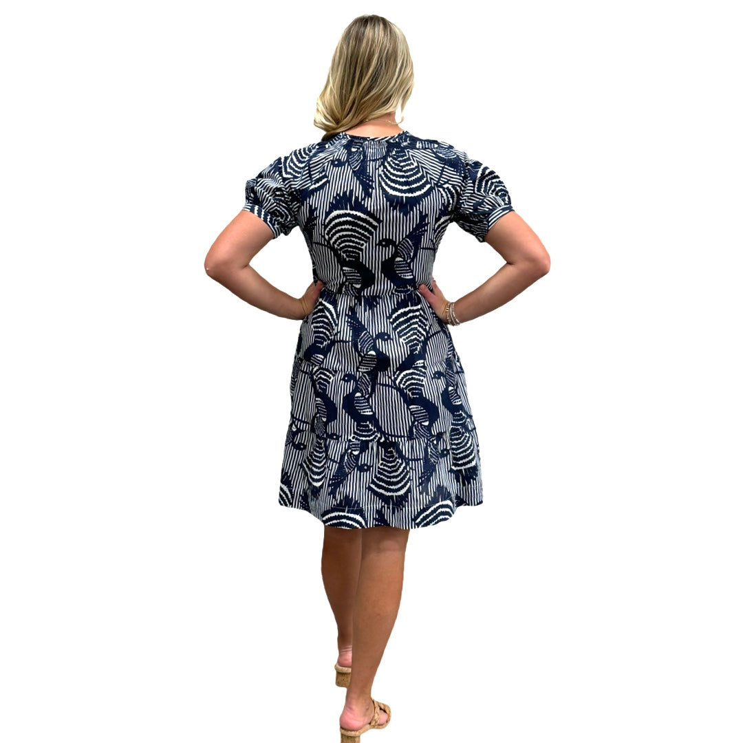 The Dahlia Smocked Neck Dress in Navy Striped Bird Print — view 7