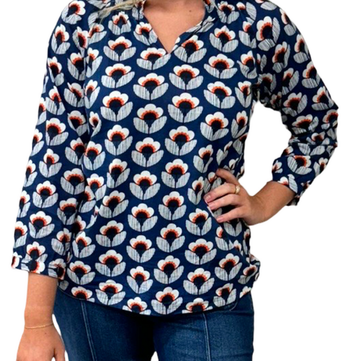 The Dahlia Smocked Neck Top in Navy and Orange Floral — view 9