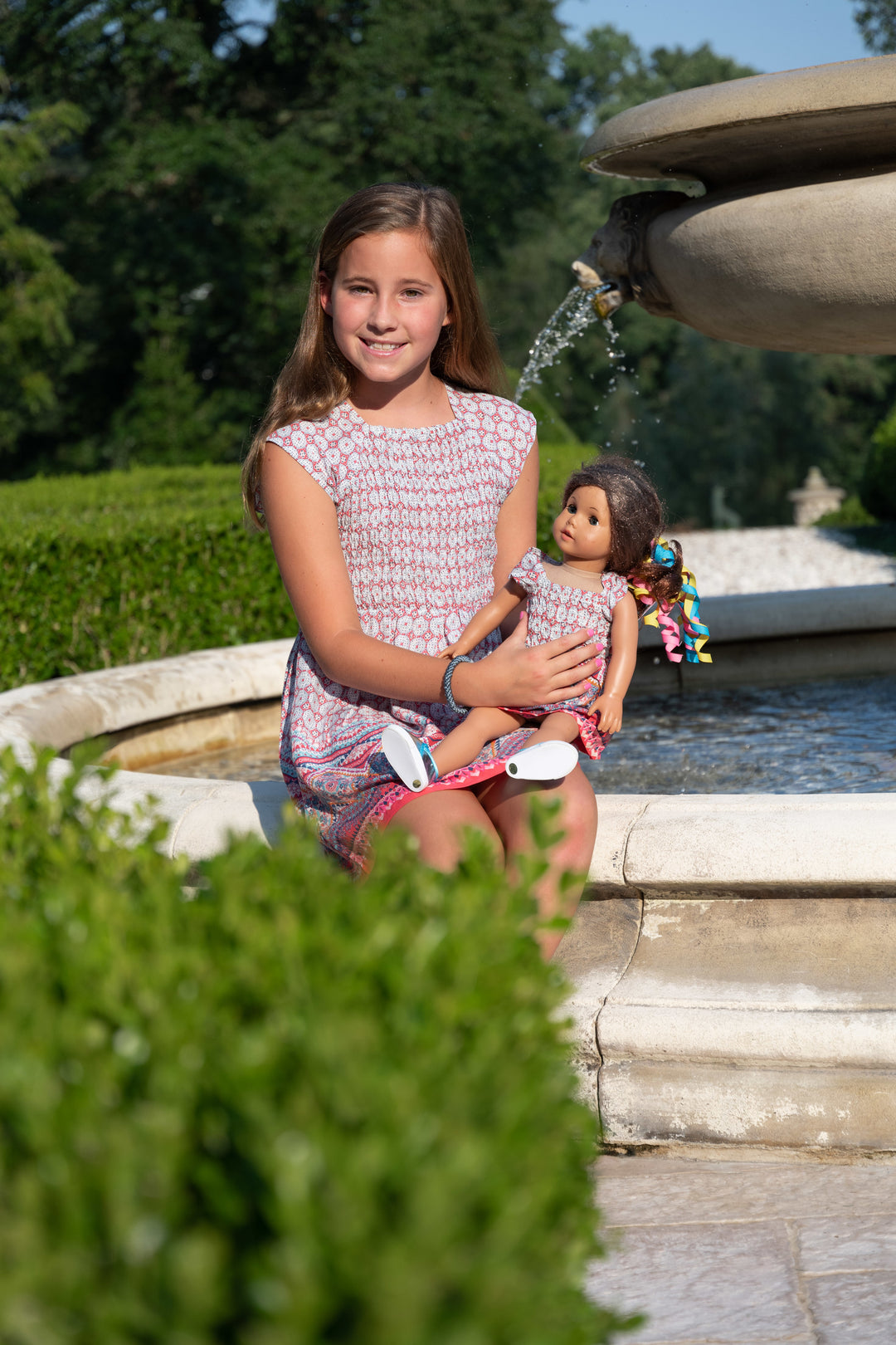 The Cloey Smocked Dress For Girls in Coral — view 4