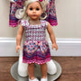 The Cloey Doll Dress in Coral