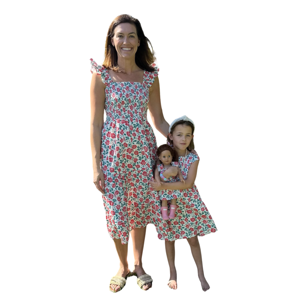 The Cloey Smocked Girl’s Dress in White and Pink Floral — view 2