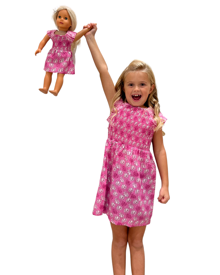 The Cloey Smocked Cotton Dress in Party Pink